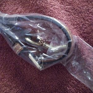 Dooney and Bourke leather purse strap.